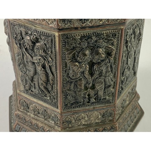 254 - ORIENTAL OCTAGONAL BRONZE (?) VASE WITH RELIEF DECORATED PANELS DEPICTING DANCING FIGURES, APPROX. 1... 