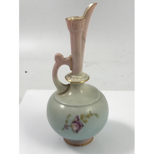 44 - ROYAL WORCESTER EWER DECORATED WITH HAND PAINTED FLOWERS