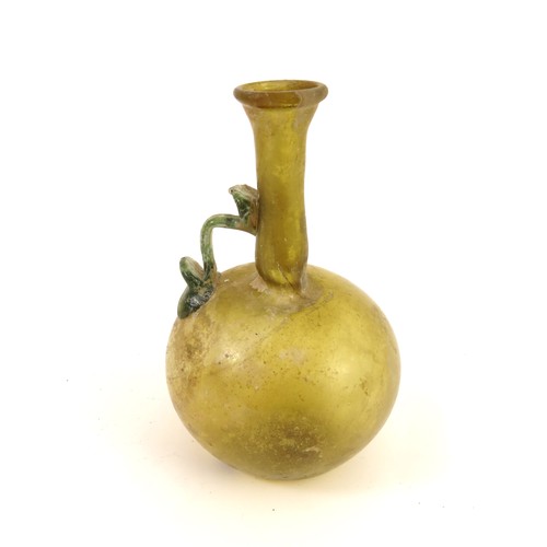 124 - ROMAN OLIVE GREEN GLASS FLASK, 3RD-4TH CENTURY AD, WITH GLOBULAR BODY AND EVERTED RIM, BLUE GLASS HA... 