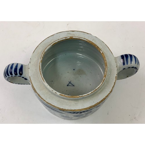 91 - DELFT WARE 2 HANDLED BLUE AND WHITE POT WITH FLOWER DECORATION, APPROX. 15 cm dia.