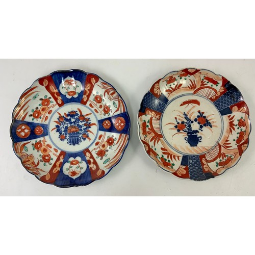 107 - 2, ORIENTAL IMARI DECORATED SCALLOPED DISHES WITH CENTRAL FLOWER BASKET DECORATION, LARGEST APPROX. ... 