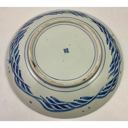 106 - ORIENTAL BLUE AND WHITE CHARGER WITH STORK DECORATION AND SEAL MARK TO BASE, APPROX. 36 cm dia.