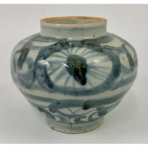 100 - A CHINESE MING DYNASTY VASE OF TAPERED OVOID FORM WITH LOOSELY PAINTED BLUE GLAZE DECORATION, APPROX... 