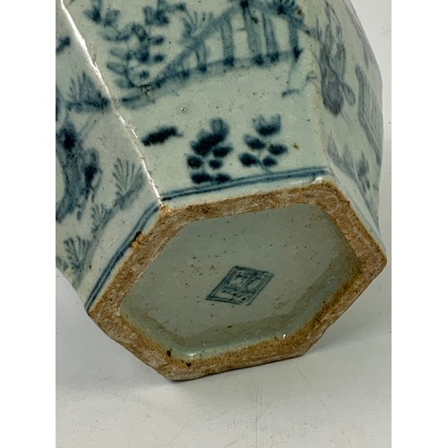 101 - POSSIBLY MING PERIOD HEXAGONAL VASE WITH LOOSELY PAINTED BLUE GLAZED DECORATION DEPICTING FIGURES IN... 