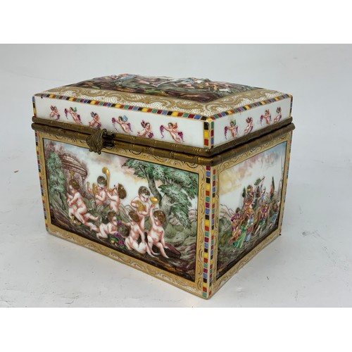 77 - GOOD QUALITY CONTINENTAL PORCELAIN CASKET WITH CLASSICAL SCENES ON EACH PANEL AND GILT METAL MOUNTS,... 