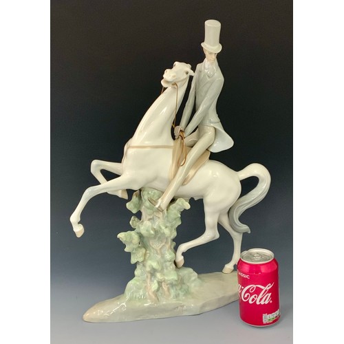 66 - LARGE LLADRO FIGURE OF MAN ON HORSE BACK, approx.48 cm, repair to trunk