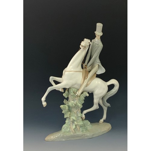 66 - LARGE LLADRO FIGURE OF MAN ON HORSE BACK, approx.48 cm, repair to trunk