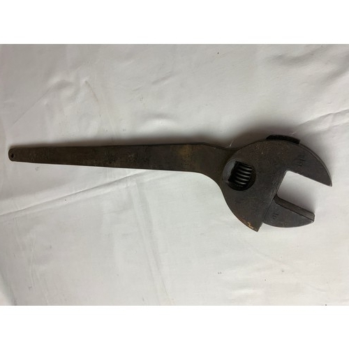 218 - LARGE HEAVY DUTY ADJUSTABLE SPANNER , MARKED 1010