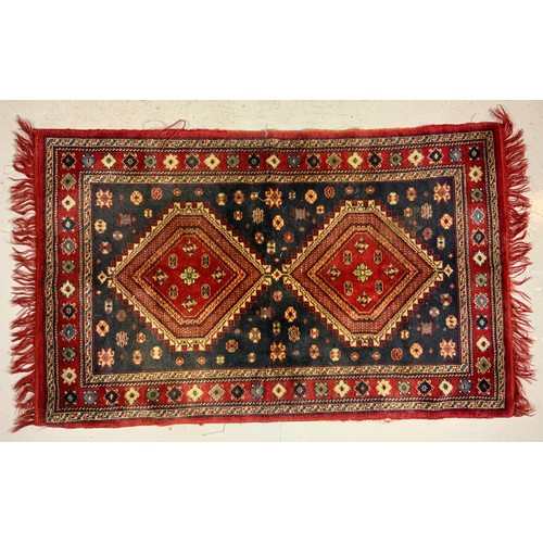 679 - RED GROUND RUG, APPROX. 153 X 87 cm overall