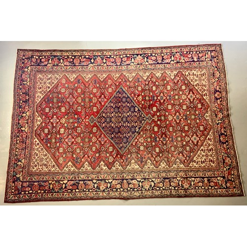 684 - IRANIAN RED GROUND RUG, APPROX. 382 X 277 cm