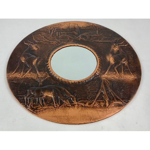 55 - ARTS AND CRAFTS STYLE MIRROR WITH EMBOSSED COPPER SURROUND DEPICTING STAGS AND DEER, INDISTINCT MONO... 