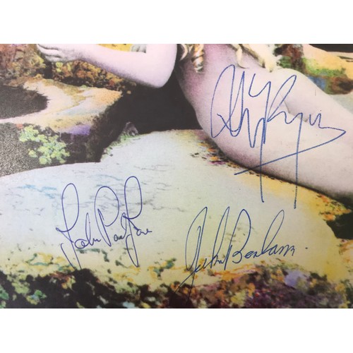 306 - LED ZEPPELIN HOUSE OF THE HOLY LP SIGNED BY ROBERT PLANT, JIMMY PAGE, JOHN PAUL JONES, AND JOHN BONH... 