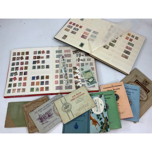 580 - 2 STAMP ALBUMS AND SUNDRY CIGARETTE CARDS ALBUMS.