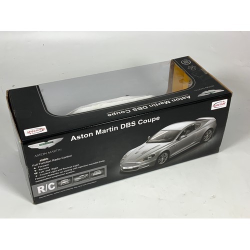 74 - BOXED, RADSTAR RADIO CONTROLLED ASTON MARTIN DBS COUPE