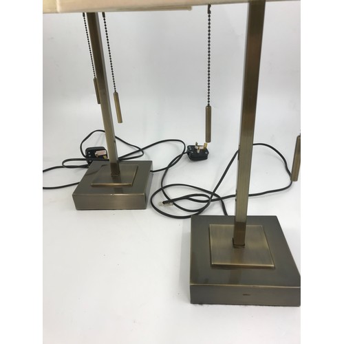 323 - PAIR OF MODERN LAMPS ON METAL BASES