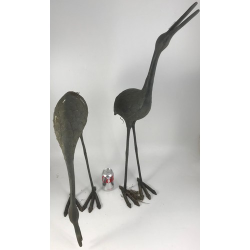 503 - PAIR OF METAL STORKS TALLEST 89cm