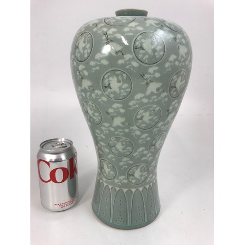 162 - LARGE ORIENTAL CELEDON GLAZED VASE WITH BIRD DECORATION  32cm TALL