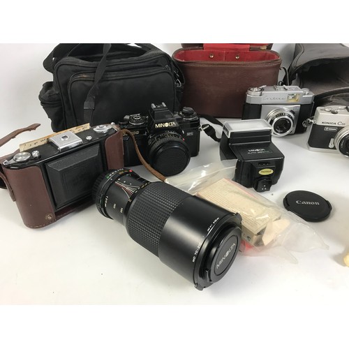 211 - MISC. 35MM CAMERAS AND ACCESSORIES INCLUDING MINOLTA 70-210 ZOOM LENS