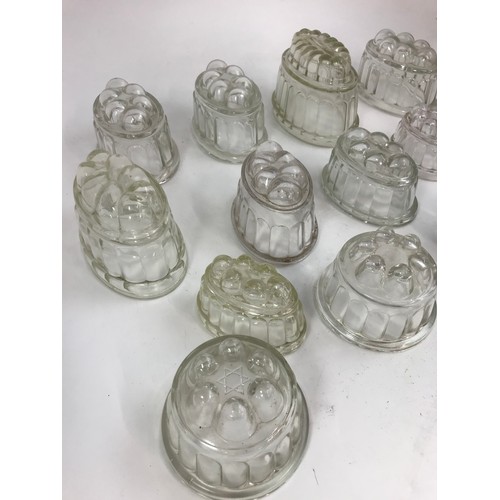 183 - COLLECTION OF GLASS JELLY MOULDS