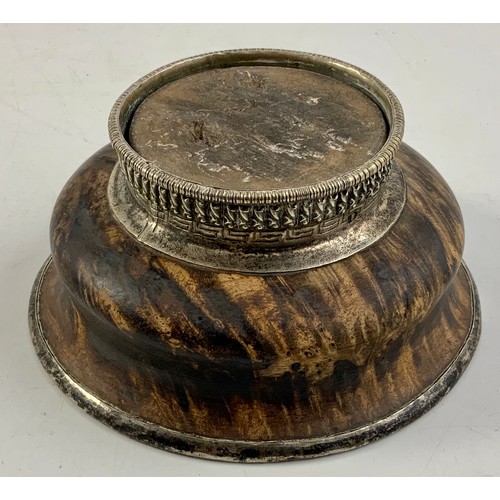 354 - AN INDONESIAN STYLE TURNED WOODEN BOWL WITH WHITE METAL MOUNTS, RELIEF CAST AND GREEK KEY ENGRAVED D... 