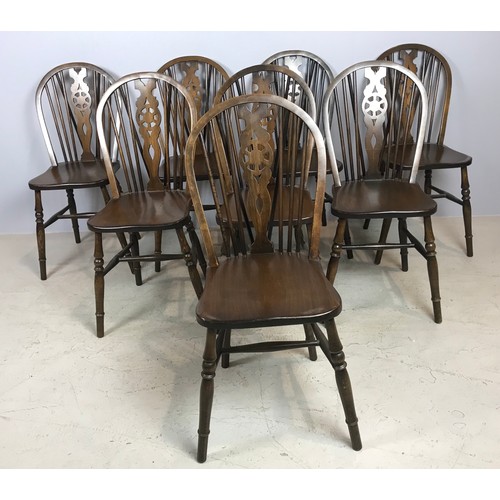 673 - SET OF 8 DARK OAK WHEEL BACK CHAIRS