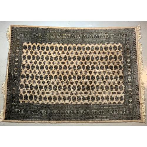 683 - BROWN/ BEIGE GROUND RUG 305 x 226 cm approx.