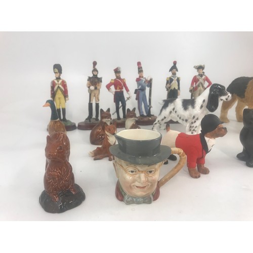 77 - COLLECTION OF ORNAMENTS INC ROYAL DOULTON DOG HN1109, BESWICK DUCK, MILITARY FIGURES, CHARACTER JUG ... 