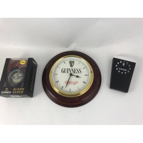 133 - COLLECTABLE GUINNESS MERCHANDISE INC PENS, BADGES, CLOCKS, MIRROR ETC