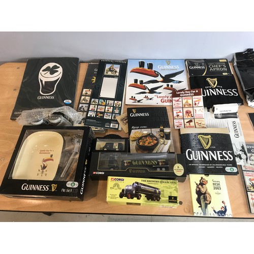 134 - GUINNESS MERCHANDISE INC CORGI CARS , PIE SET, T SHIRT, CALENDARS ETC