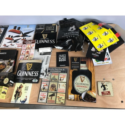 134 - GUINNESS MERCHANDISE INC CORGI CARS , PIE SET, T SHIRT, CALENDARS ETC