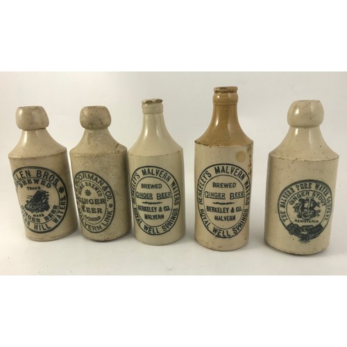 385 - 11 MALVERN ADVERTISING STONEWARE GINGER BEER BOTTLES