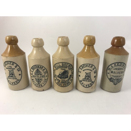 386 - 5 MALVERN ADVERTISING STONEWARE BOTTLES WITH 5 OTHER STONEWARE BOTTLES