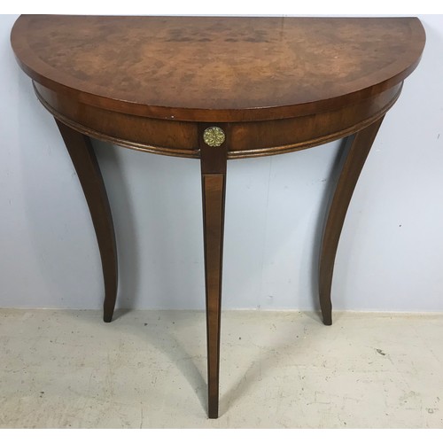 586 - DEMI LUNE TABLE AND SMALL OCCASIONAL TABLE ON FLUTED PEDESTAL, 4 SPLAYED LEGS WITH BRASS CASTERS