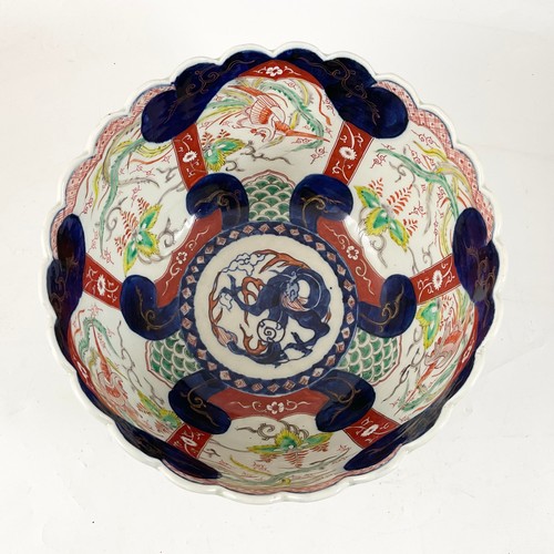 268 - LARGE IMARI DECORATED BOWL WITH FLUTED RIM