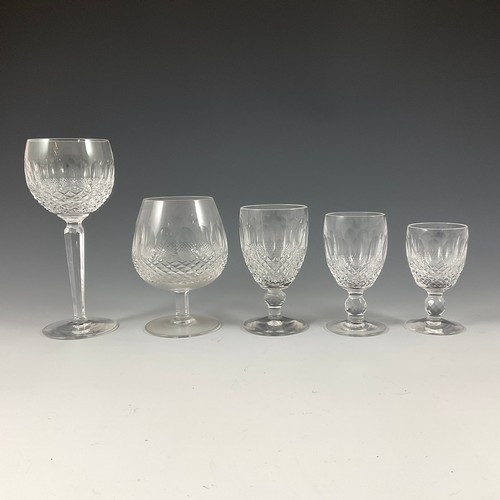 295 - A PART SUITE OF WATERFORD CRYSTAL CUT COLLEEN PATTERN STEM WARE COMPRISING SIX WINE GLASSES, 19CM HI... 