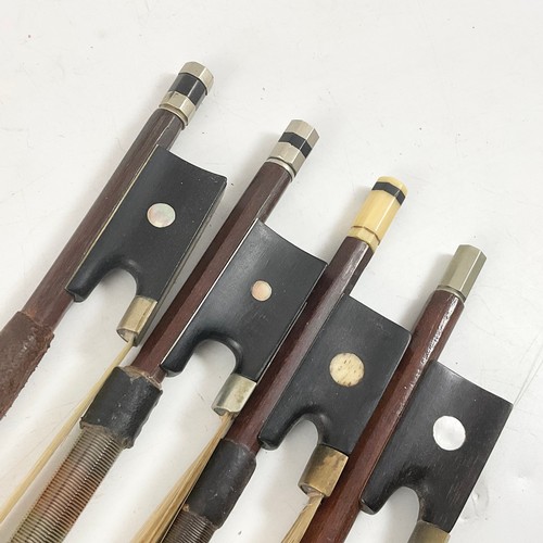 370 - FOUR PERNAMBUCO VIOLIN BOWS, EACH WITH NICKEL MOUNTED EBONY FROG AND MOTHER OF PEARL EYE, 74CM MAXIM... 