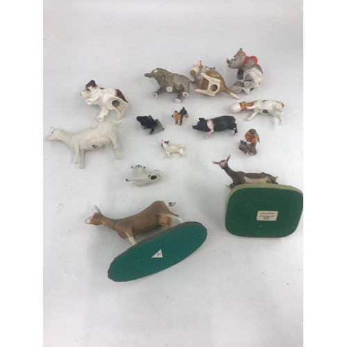 194 - COLLECTION OF ANIMAL MODELS TALLEST 17cm