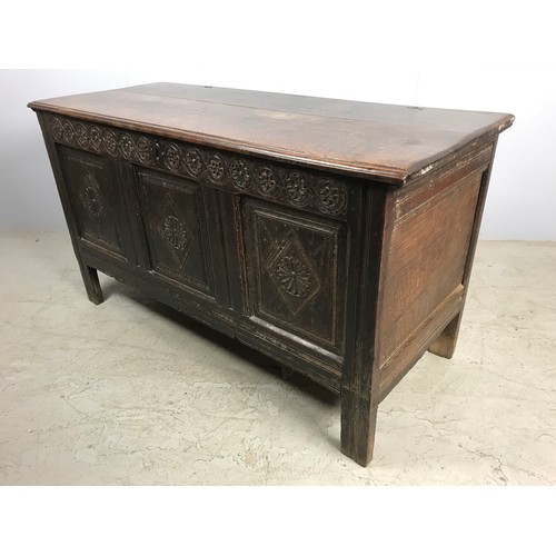 669 - CARVED OAK BLANKET CHEST ON STILE FEET, APPROX. 136 cm