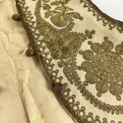 395 - CHILD’S WAISTCOAT WITH FINE GOLD THREAD EMBROIDERED DECORATION