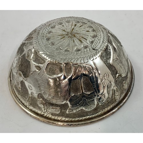 379 - 6 INDIAN WHITE METAL BOWLS WITH RELIEF DECORATION