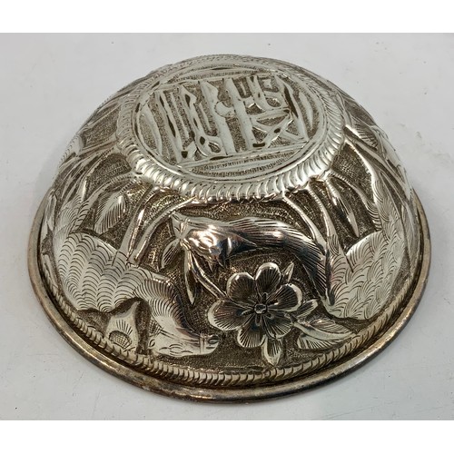 379 - 6 INDIAN WHITE METAL BOWLS WITH RELIEF DECORATION