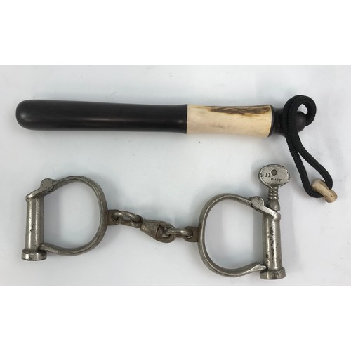 244 - TRUNCHEON  ( BONE  & WOOD , WEIGHTED ) WITH A PAIR OF THE COUNTY OF WORCESTER HANDCUFFS