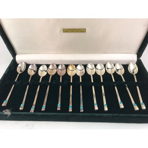 400 - BOXED SET OF 12 ORIENTAL SILVER AND ENAMEL SPOONS