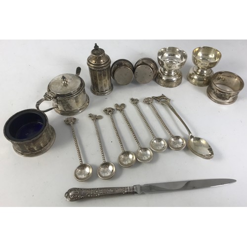 337 - MISC. SILVER CRUETS, HALF RUPEE COINS AND A SILVER SERVIETTE RING 400g Approx