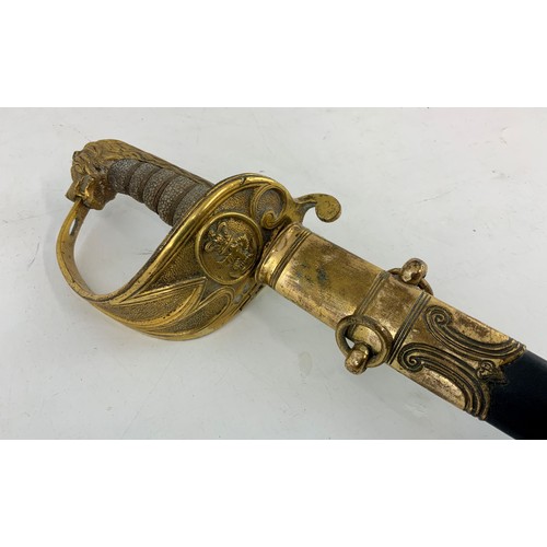 227 - NAVAL OFFICER’S SWORD AND SCABBARD, FULLERED, SLIGHTLY CURVED BLADE, APPROX. 73 cm, LION HEAD HANDLE... 