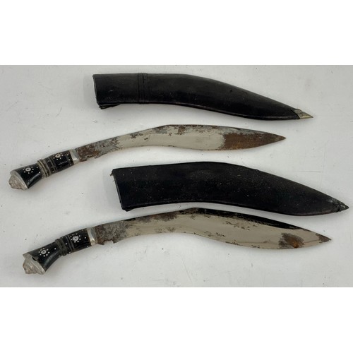 218 - 2 KUKRI WITH INLAID HANDLES AND SCABBARDS