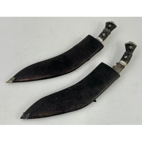 218 - 2 KUKRI WITH INLAID HANDLES AND SCABBARDS