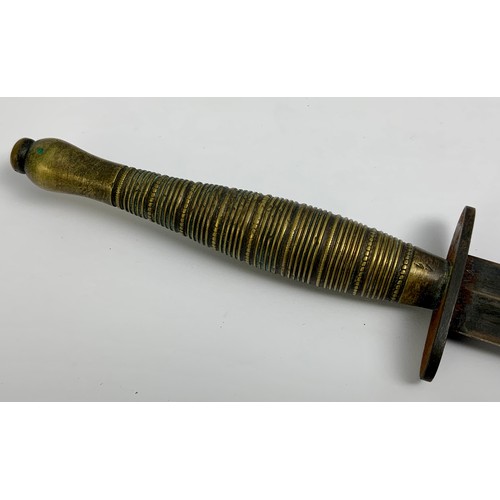 225 - FIGHTING KNIFE, POSSIBLY WWII SECOND PATTERN FAIRBURN SYKES WITH SCARCE RIBBED AND BEADED BRASS HAND... 