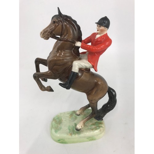 60 - BESWICK HUNTSMAN ON REARING HORSE MODEL NO 868