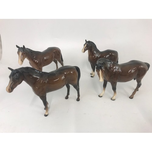 67 - COLLECTION OF 7 BROWN BESWICK HORSE MODELS TALLEST 21CM